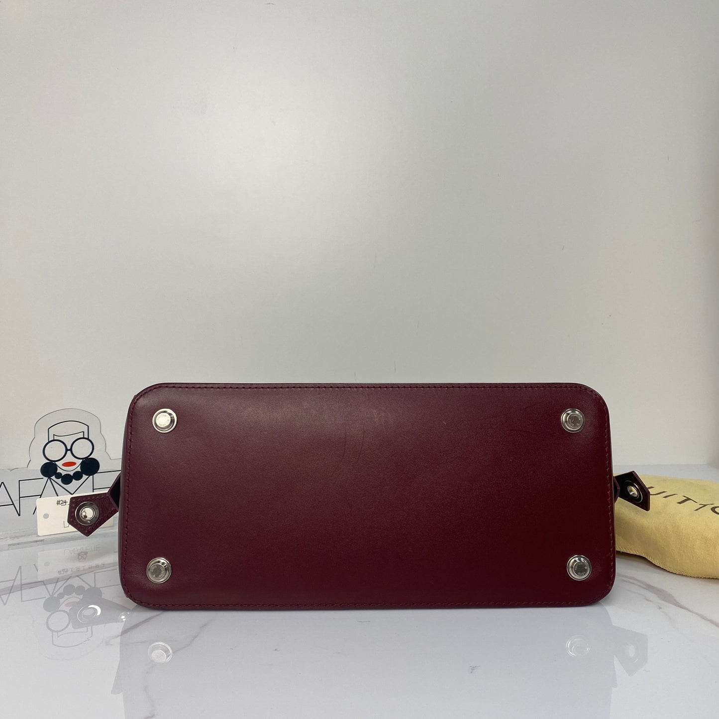 Base of the Louis Vuitton Dora Monogram PM