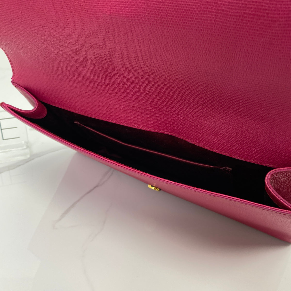 Saint Laurent Y Ligne Clutch, fuchsia pink calfskin, gold-tone Y closure — detail view 5