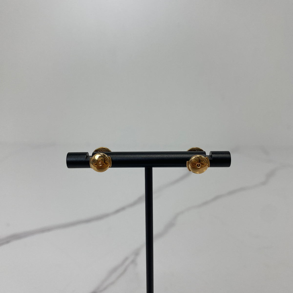 Hermès Ex-Libris Earrings — scale view