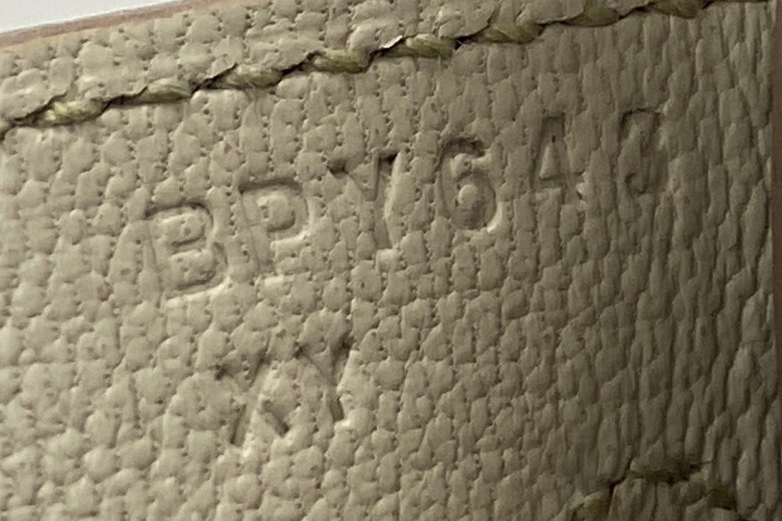 Hermès blind stamp on a Birkin 25 in Béton Epsom leather: bare letter B for 2023 beside the saddle stitching