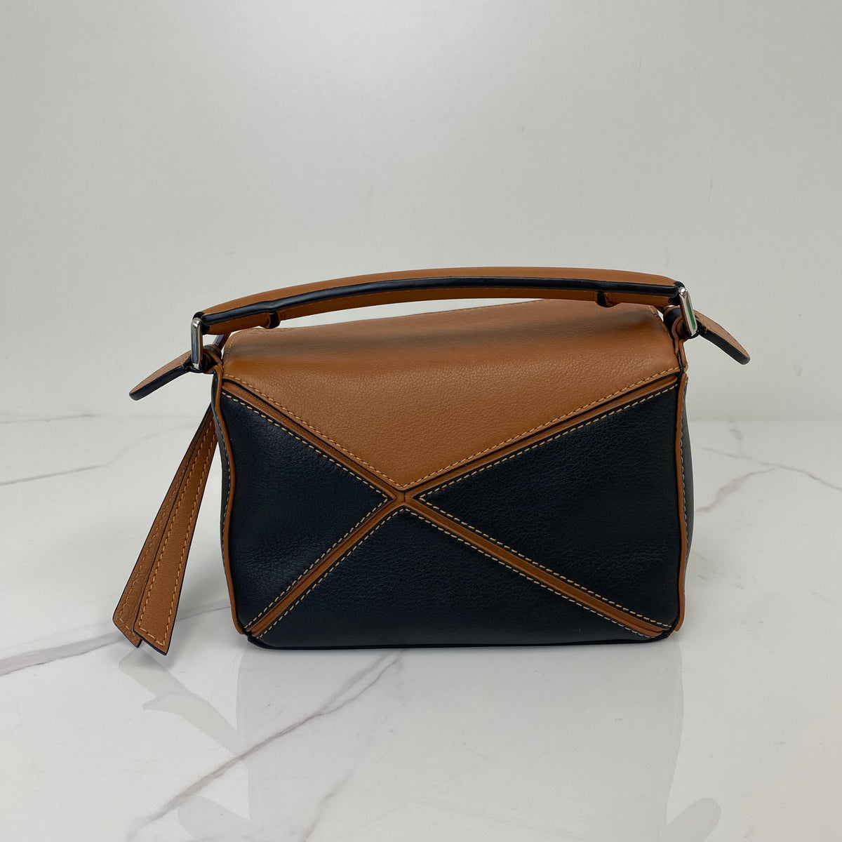 Loewe Mini puzzle, Black/Tan Soft Grained Calfskin, Silver Tone hardware — side view