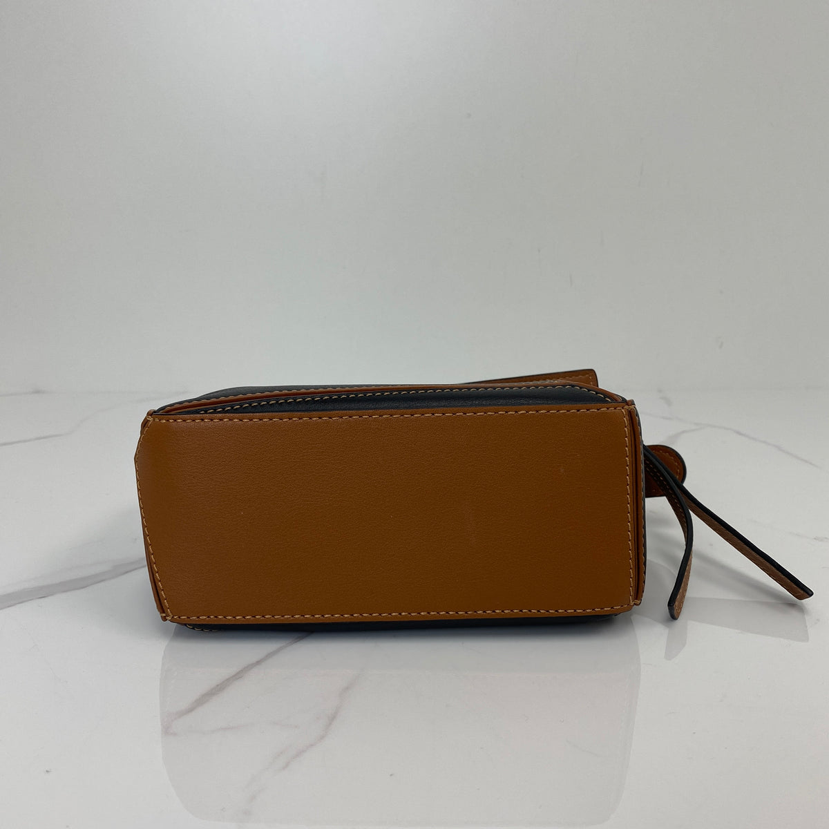 Loewe Mini puzzle, Black/Tan Soft Grained Calfskin, Silver Tone hardware — bottom view