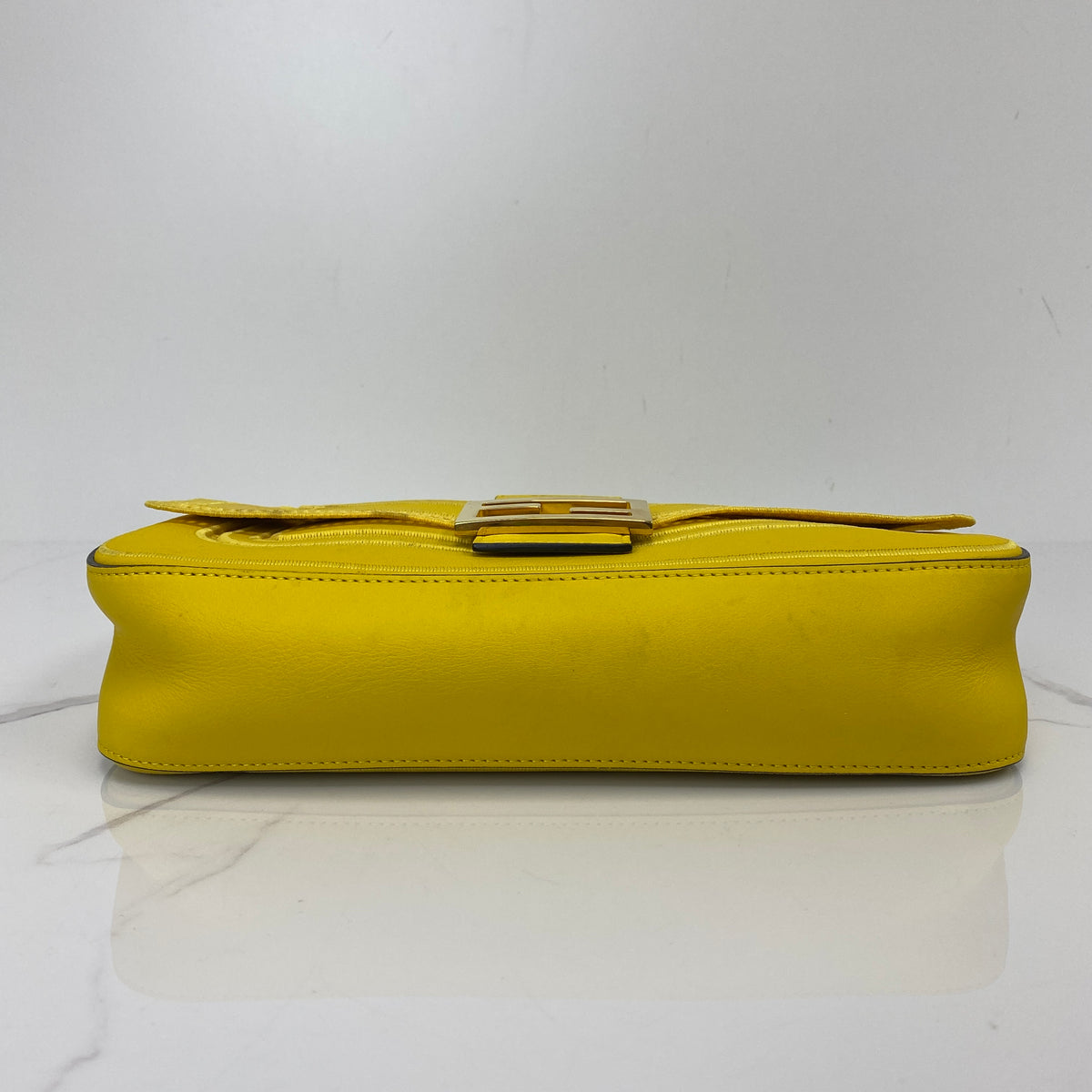 Fendi Baguette, Yellow Calfskin, Gold Tone hardware — bottom view