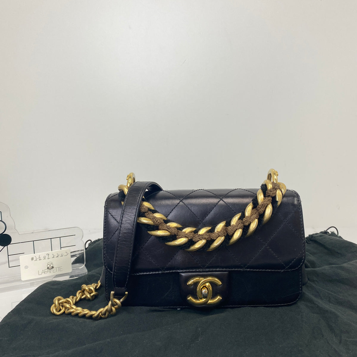Chanel Mini classic Flap Bag, Black Calfskin, Antique Gold Tone hardware — front view