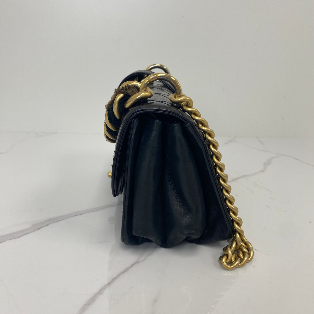 Chanel Mini classic Flap Bag, Black Calfskin, Antique Gold Tone hardware — side view