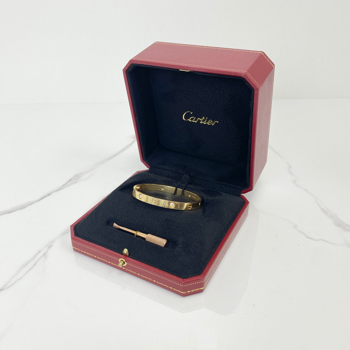 Cartier Love Bracelet, Classic Model, 4 Diamonds, 18K yellow gold with four diamonds — front view