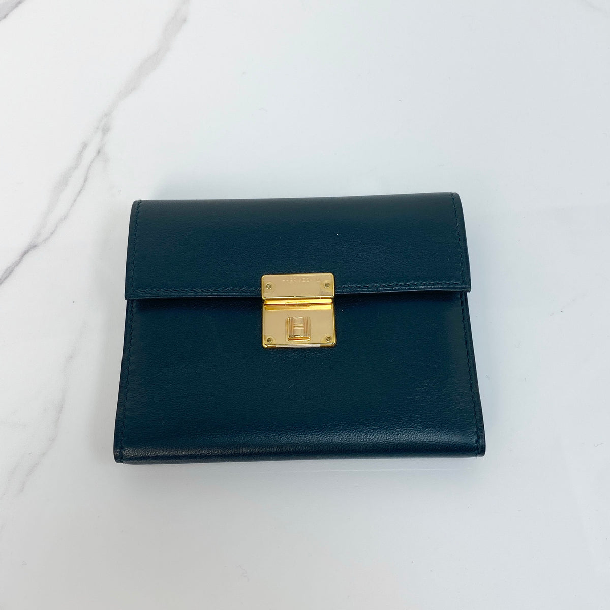 Hermès Clic 12 Wallet, black Swift calfskin, gold hardware — front view