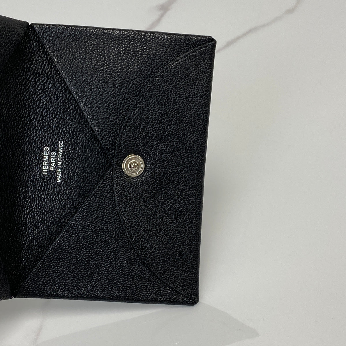 Hermès Calvi Card Holder Noir — stamp detail
