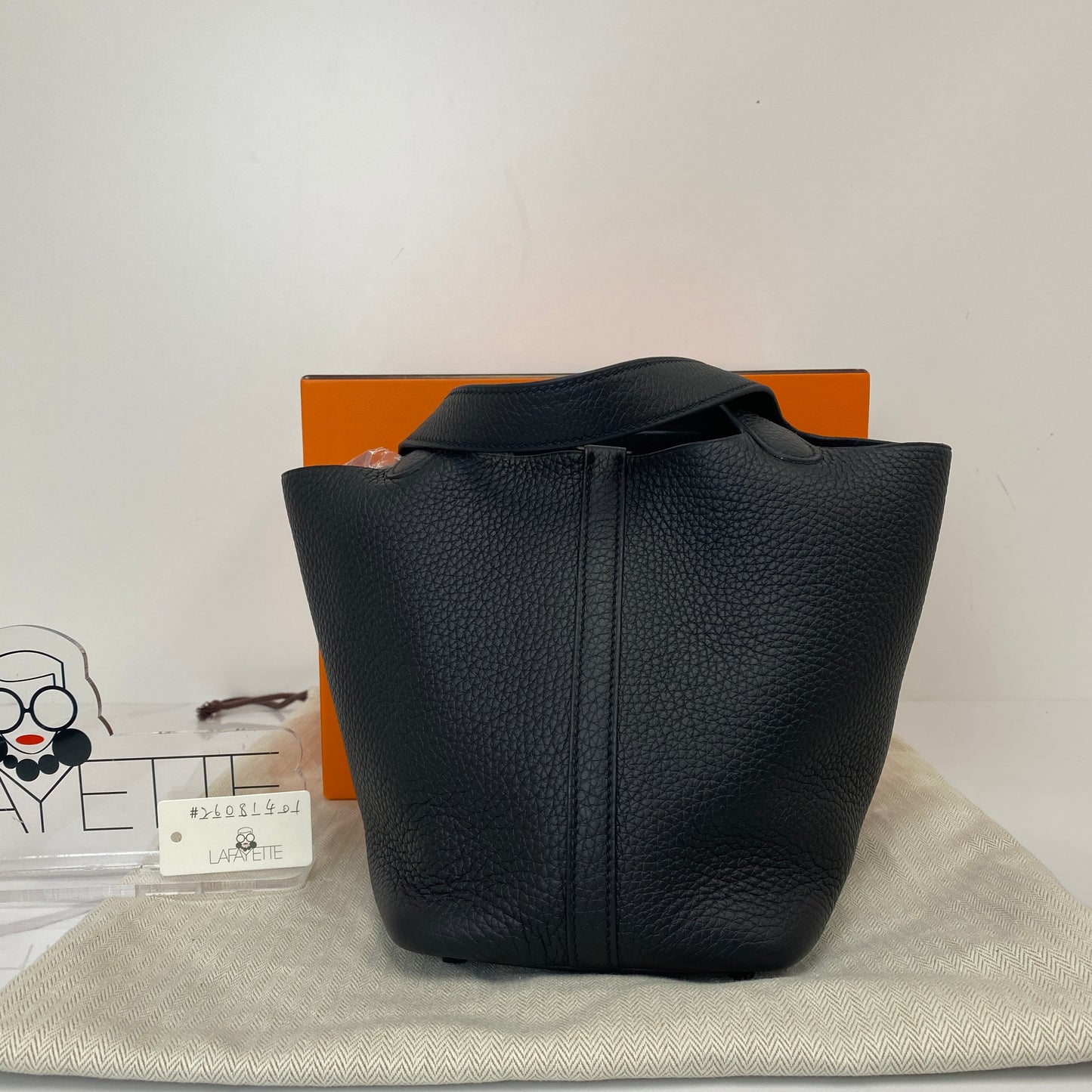 Hermès Picotin 18 shown with its orange box and dustbag