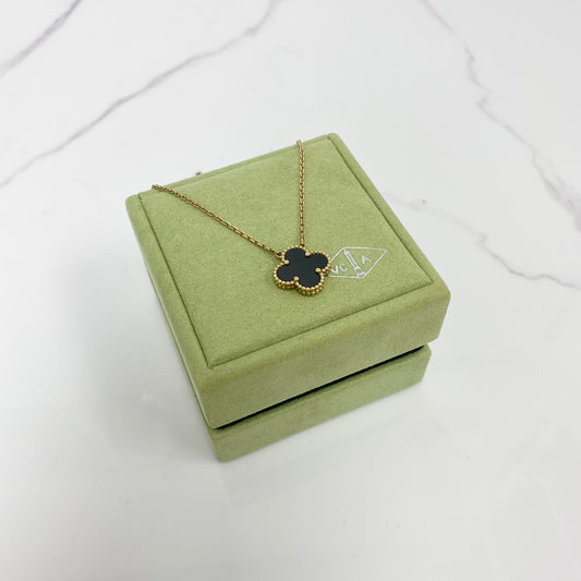 Van Cleef & Arpels Vintage Alhambra Pendant, black onyx, 18K yellow gold — front view