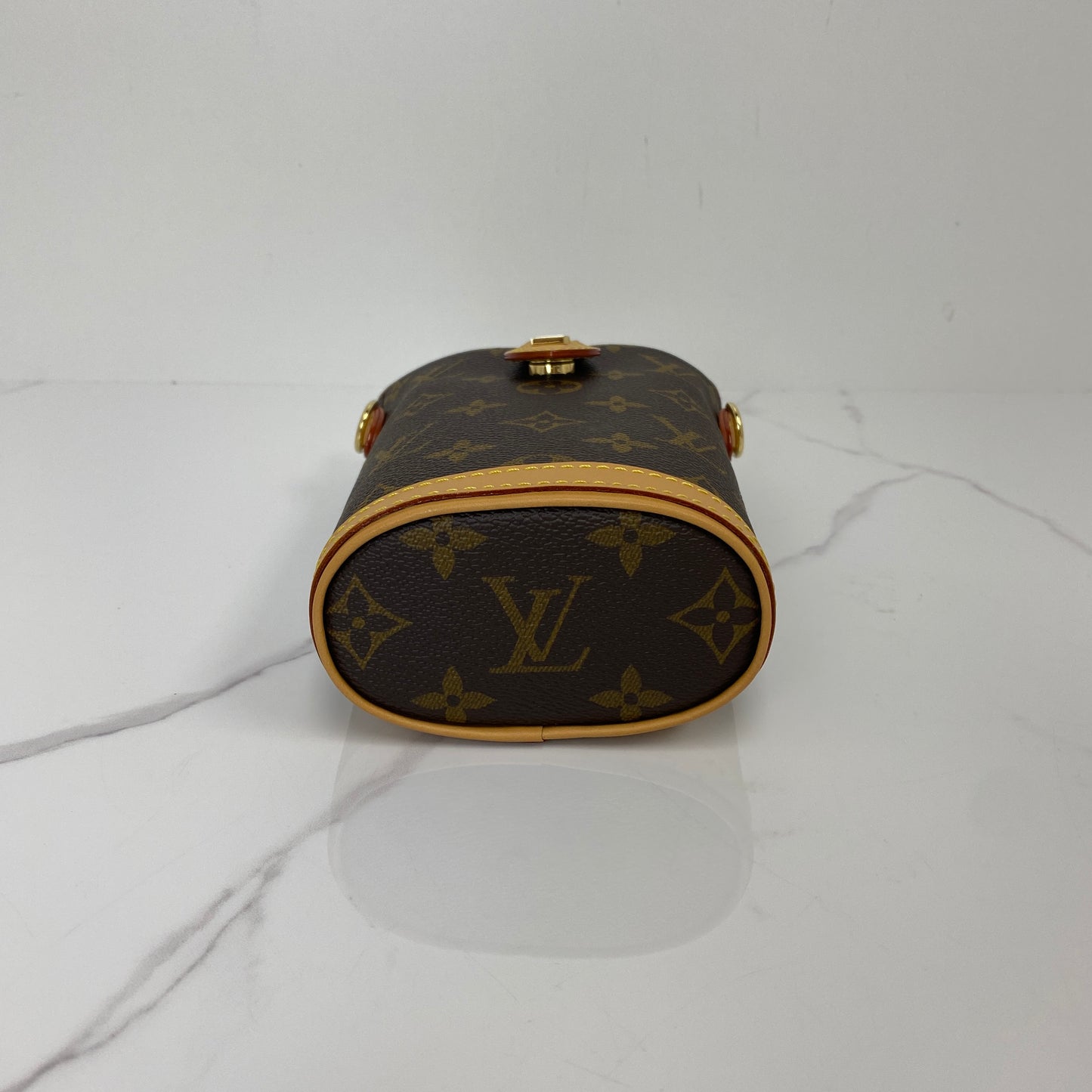 Base of the Louis Vuitton Fold Me Pouch with LV embossed leather trim
