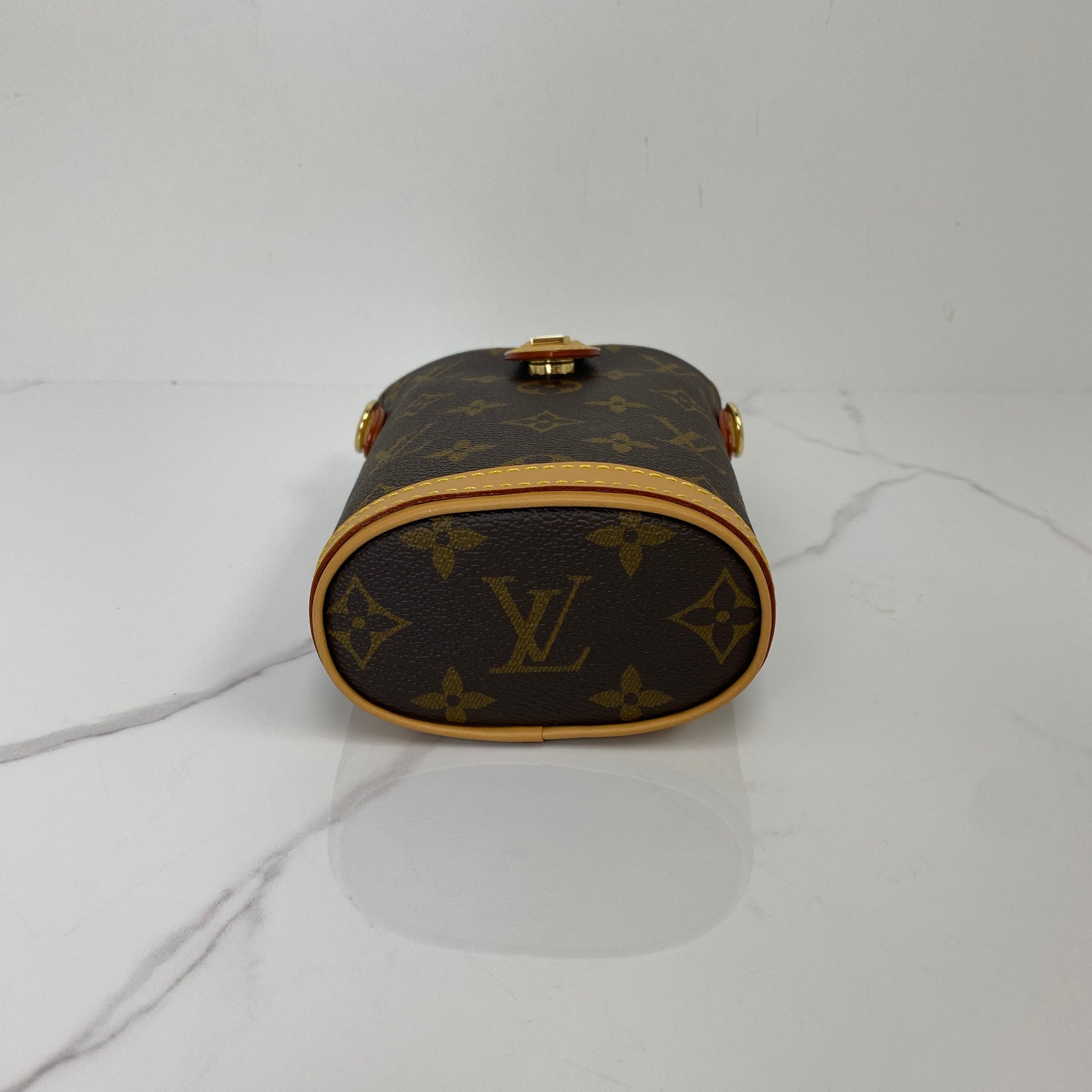 Base of the Louis Vuitton Fold Me Pouch with LV embossed leather trim
