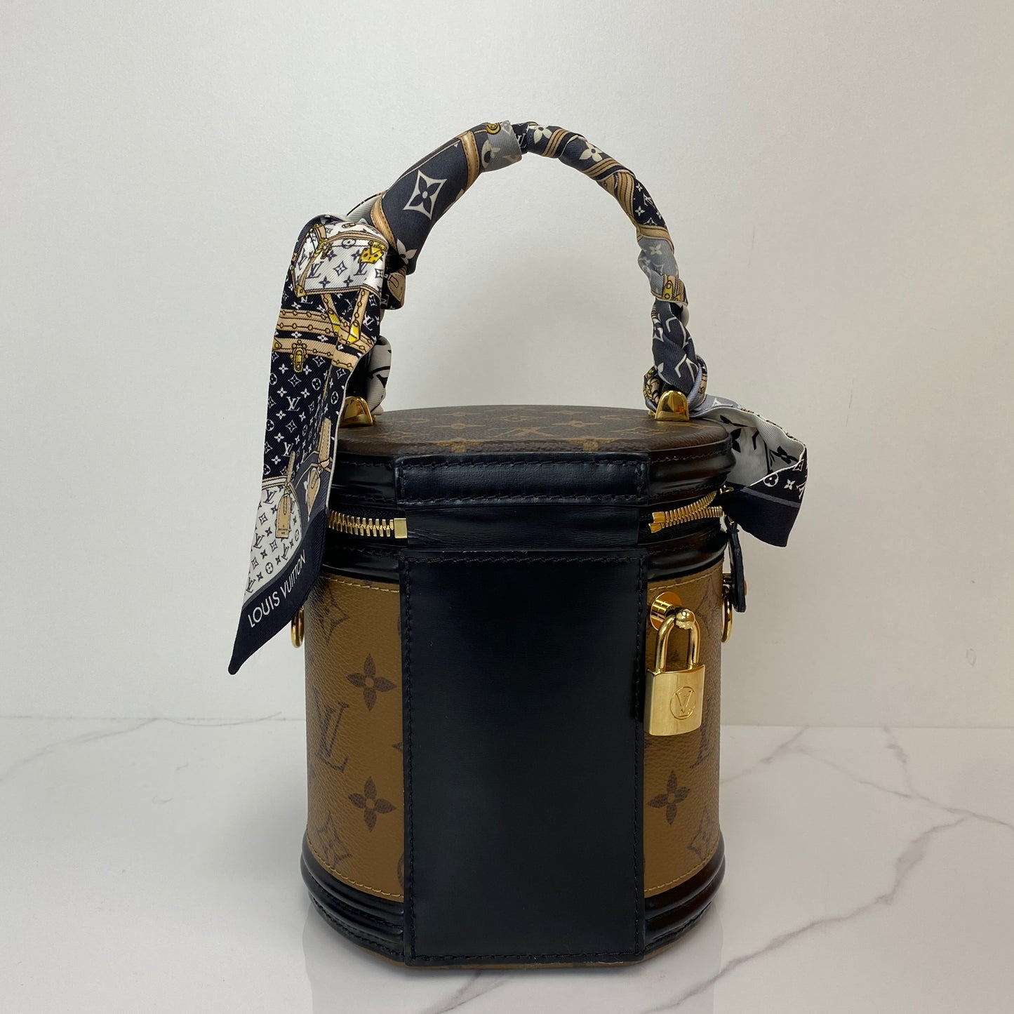 Side profile of the Louis Vuitton Cannes with shoulder strap