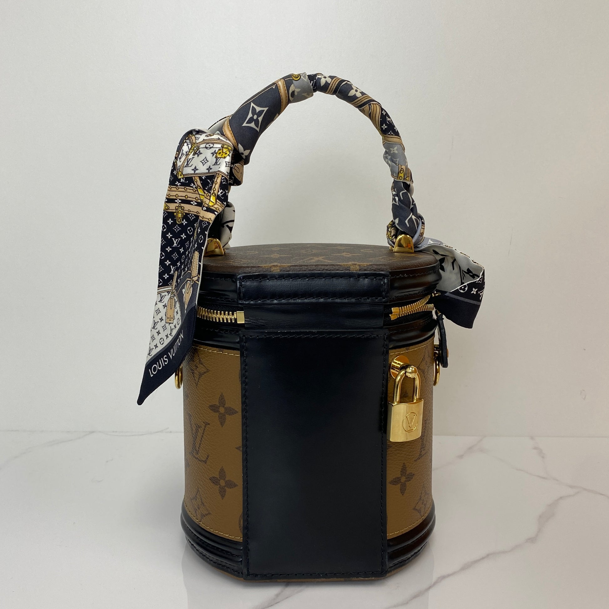 Side profile of the Louis Vuitton Cannes with shoulder strap