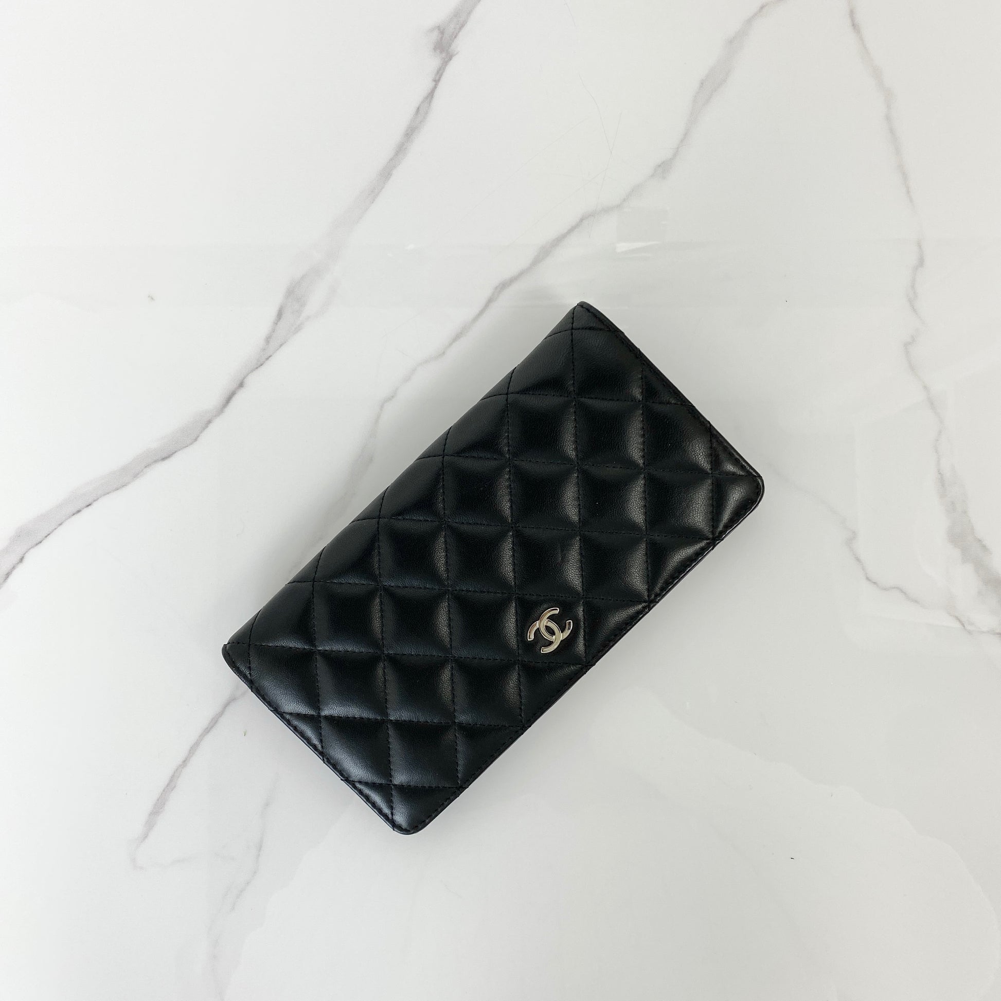 Chanel Classic Long Flap Wallet in black lambskin with silver-tone CC clasp