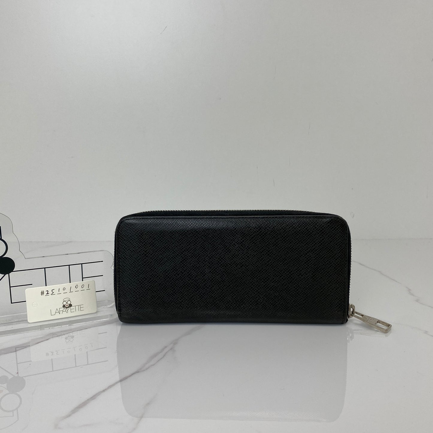 Front view of the black Louis Vuitton Zip Long Wallet