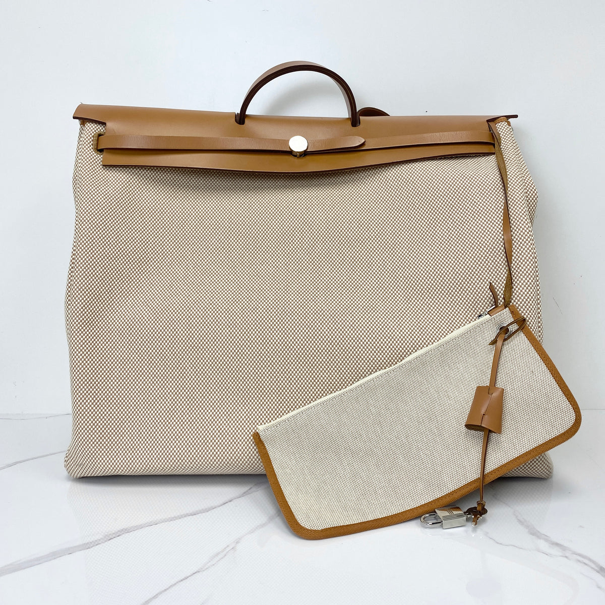 Hermès Herbag Zip Cabine Bag, ecru canvas and natural leather, palladium hardware — front view