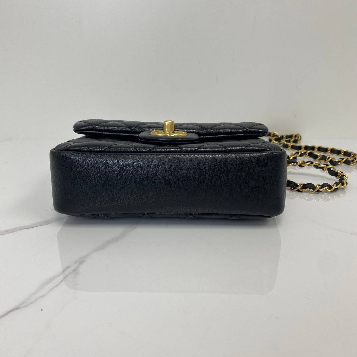 Chanel Pearl Twist Mini Classic Flap Bag, black lambskin, gold-tone hardware, pearl detail — detail view 4