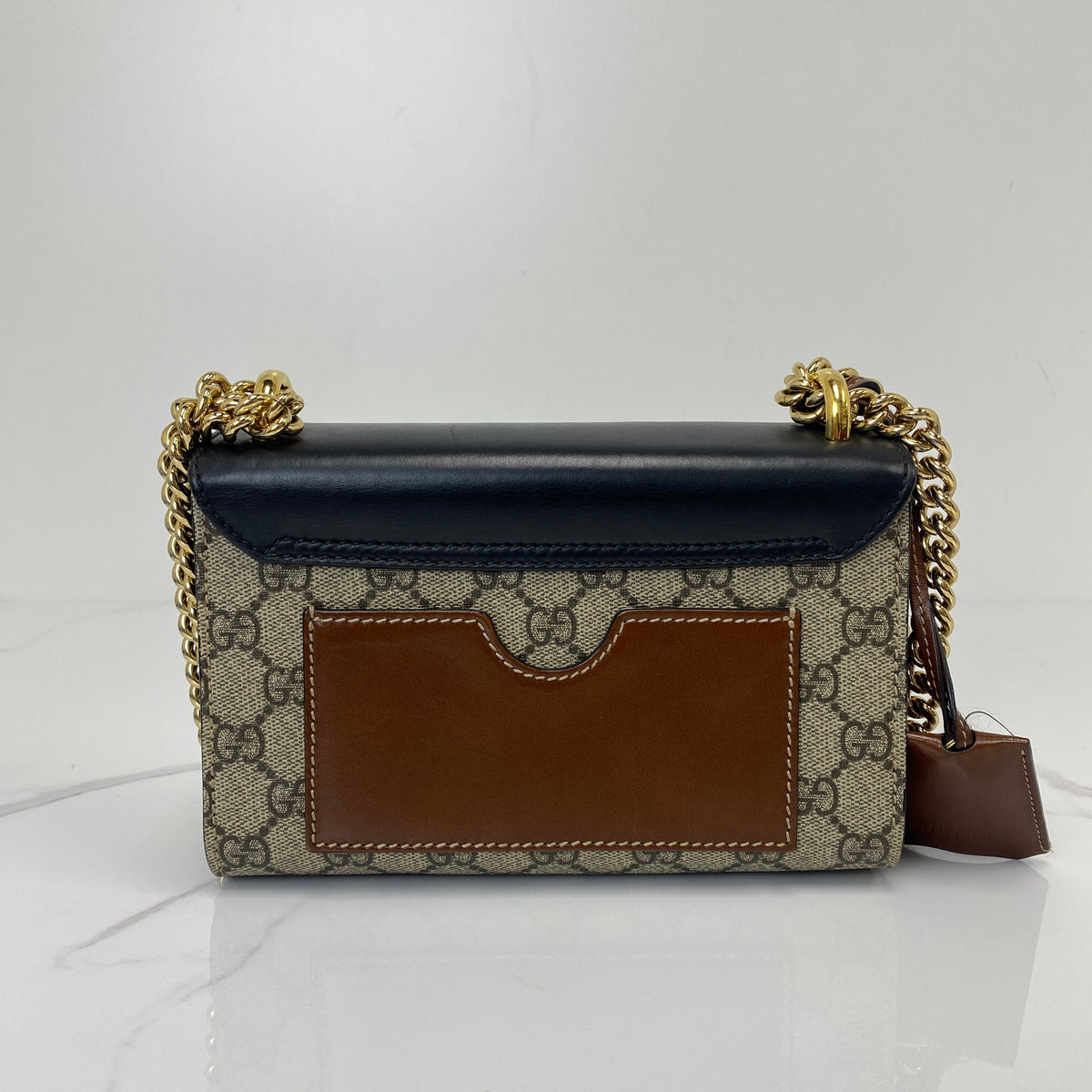 Gucci Padlock GG Supreme Shoulder Bag, black GG Supreme canvas, gold-tone padlock — detail view 1