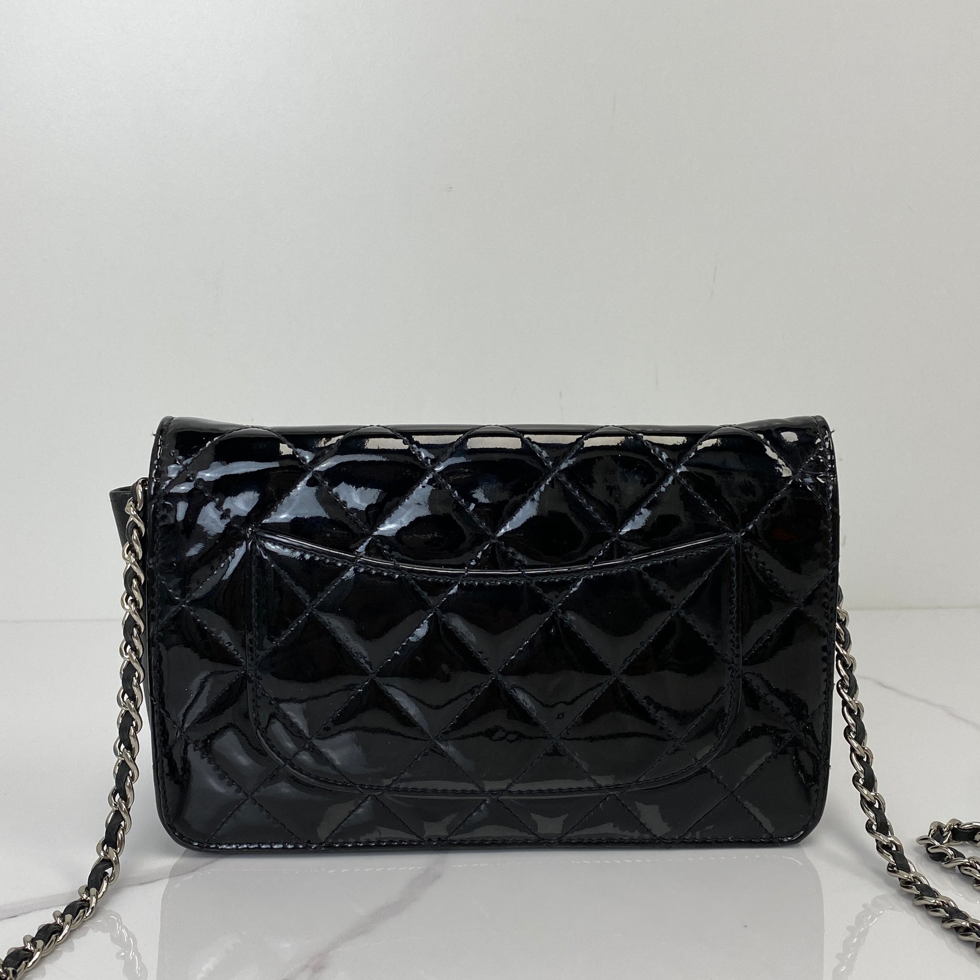 Back view of the Chanel Wallet On Chain showing the rear slip pocket