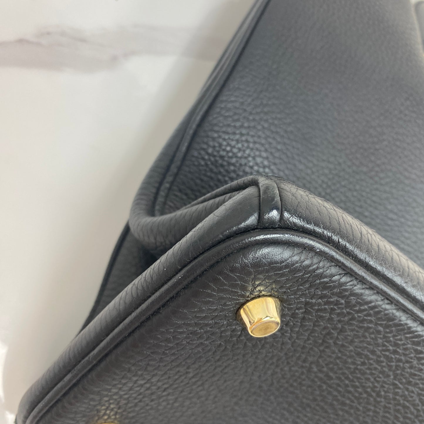 Dior Diorissimo tote shown with its strap and dustbag