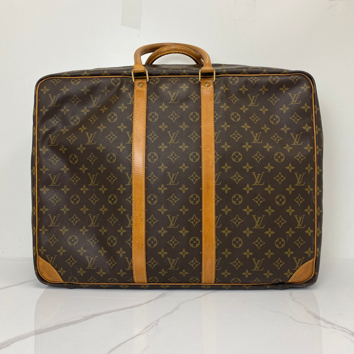 Louis Vuitton Monogram Sirius 55 Vintage Luggage Bag, brown Monogram canvas, Vachetta trim — detail view 3