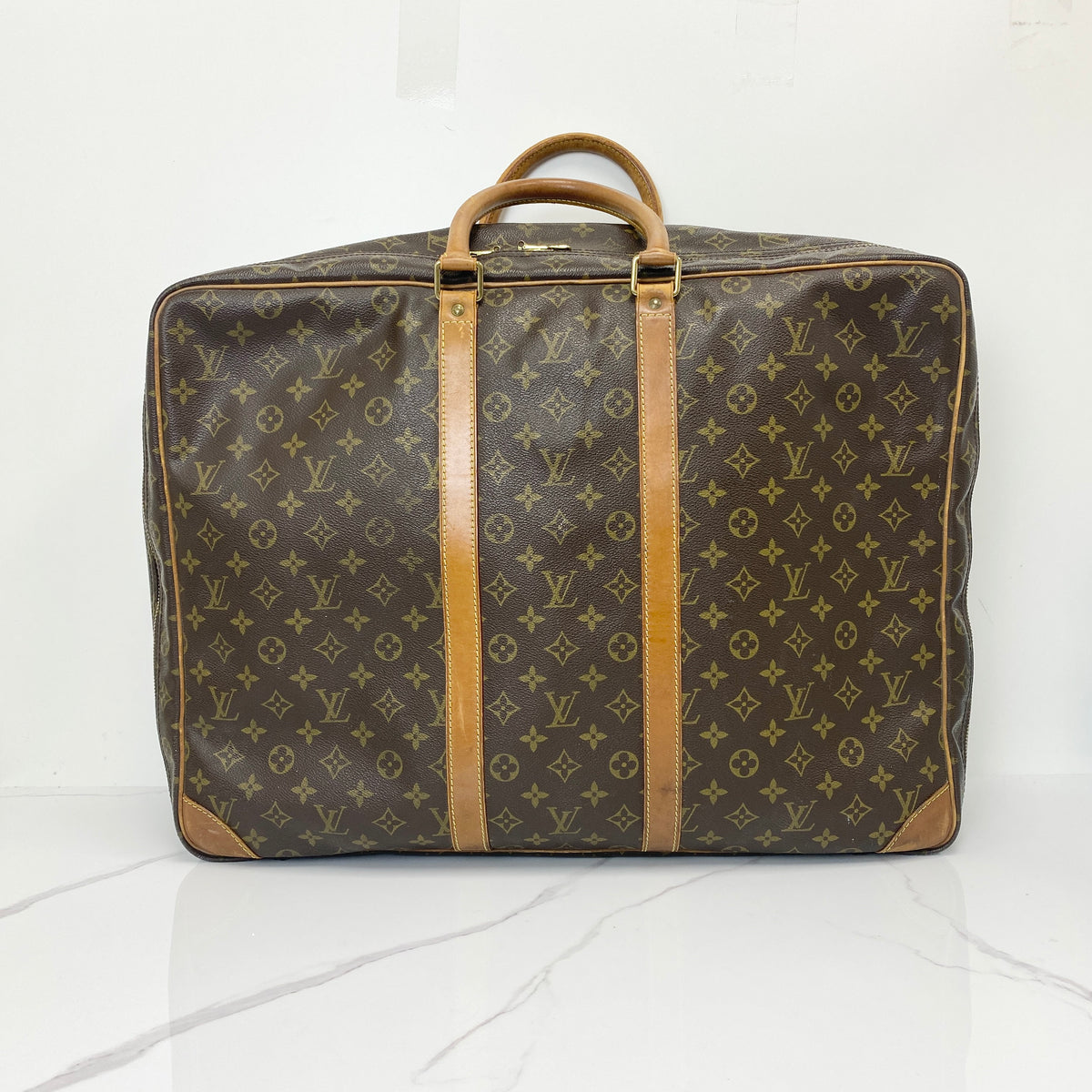 Louis Vuitton Monogram Sirius 55 Vintage Luggage Bag, brown Monogram canvas, Vachetta trim — front view