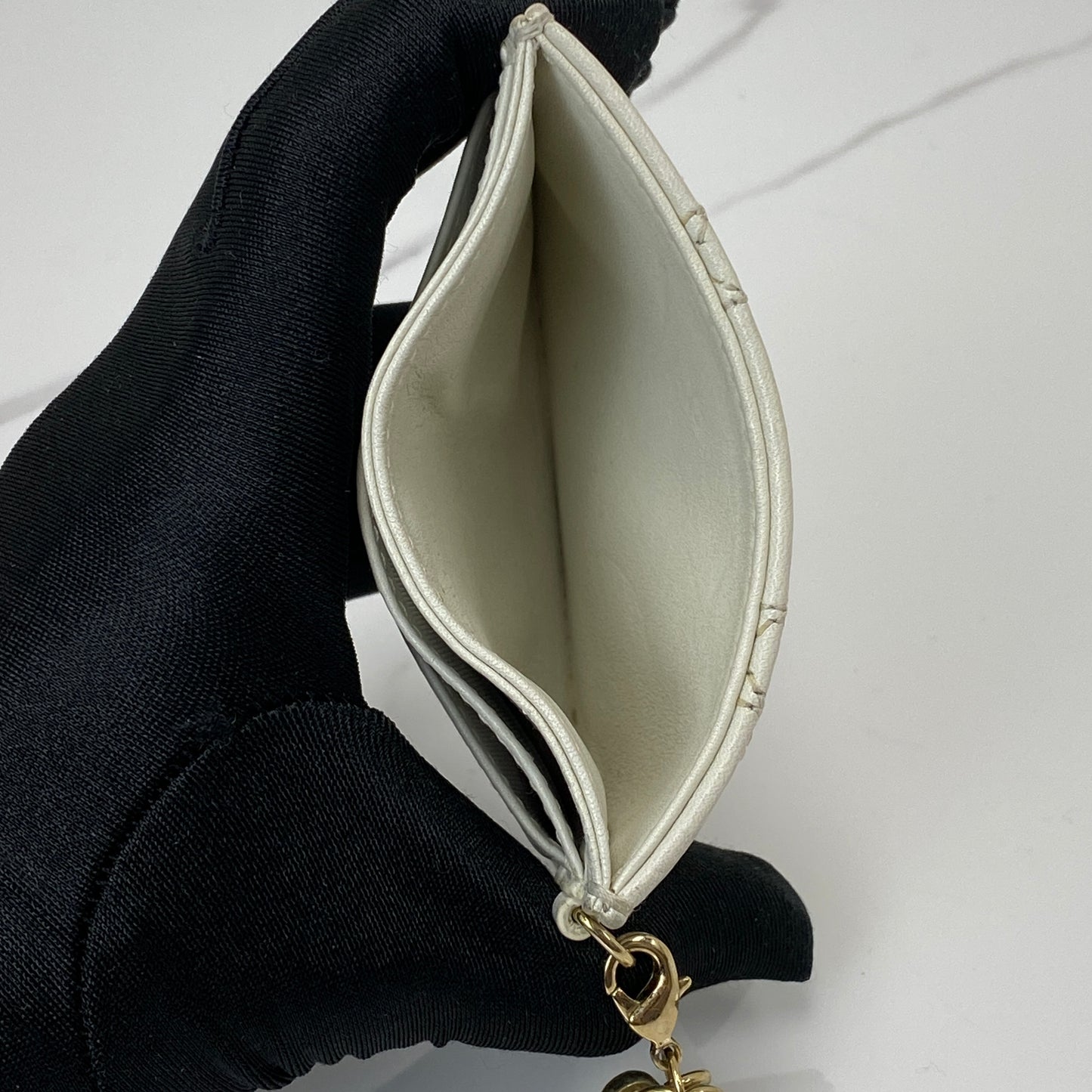 Detail of the red heart motif on the Dior Valentine Card Holder