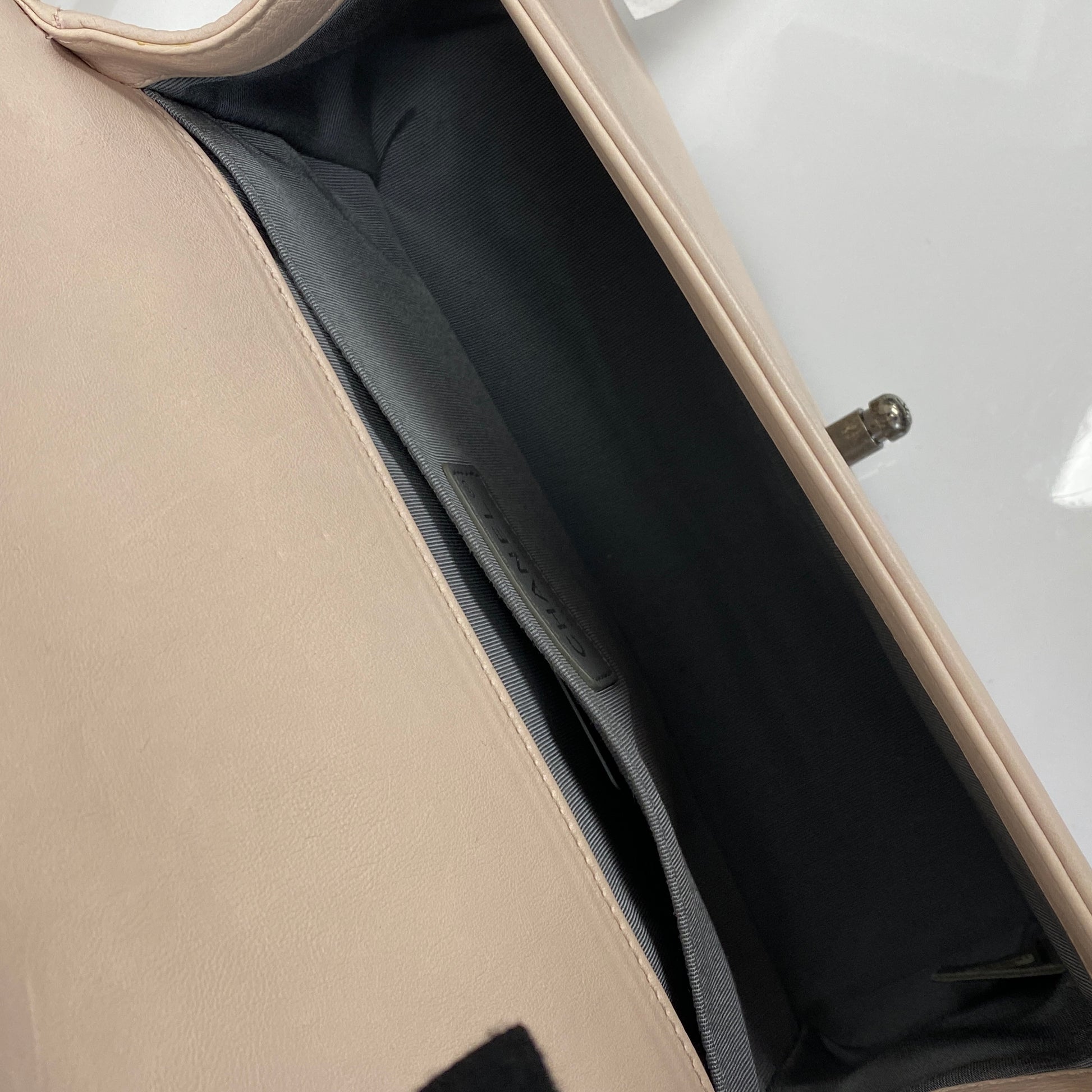 Chanel Boy Bag shown with its box, dustbag and ID card