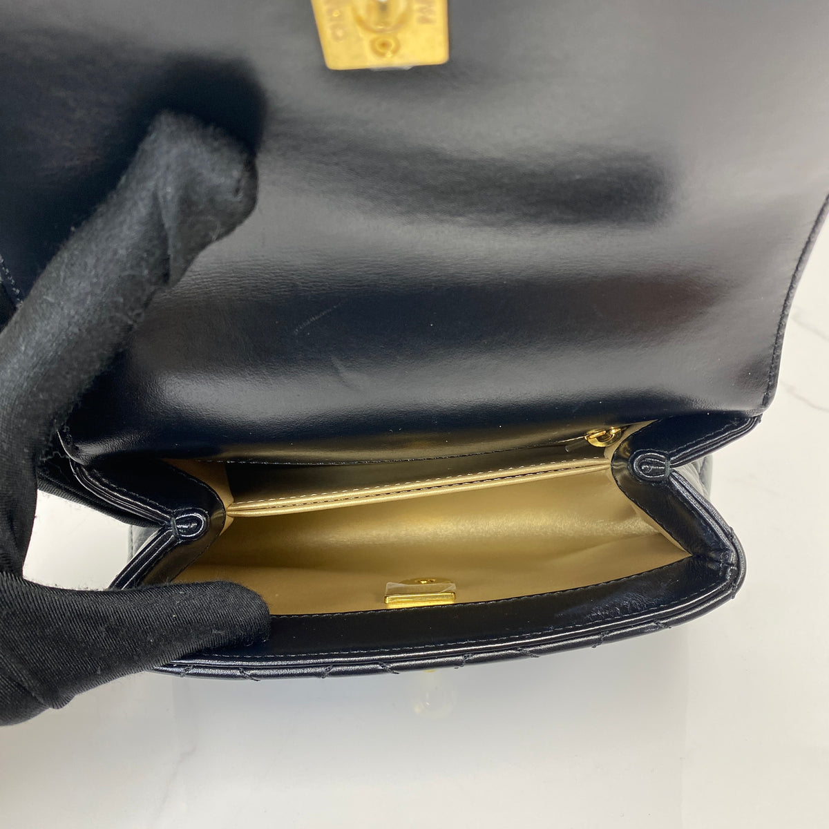 Chanel Mini Coco Handle, black shiny calfskin, gold-tone hardware — detail view 5