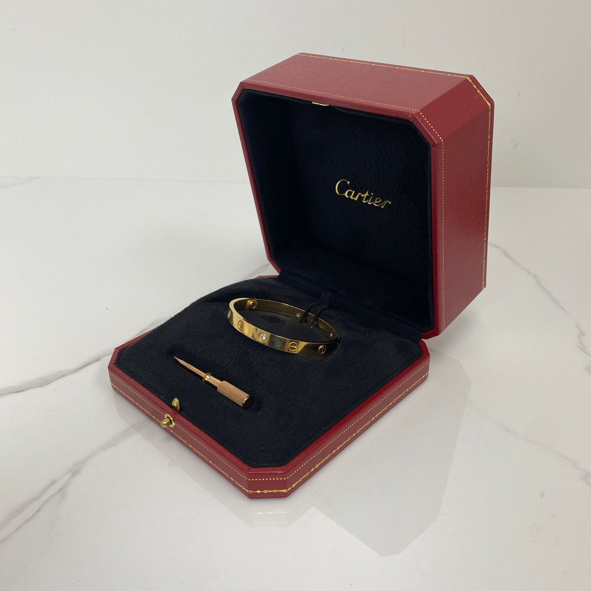 Cartier Love Bracelet, Classic Model, 4 Diamonds, 18K yellow gold with four diamonds — detail view 3