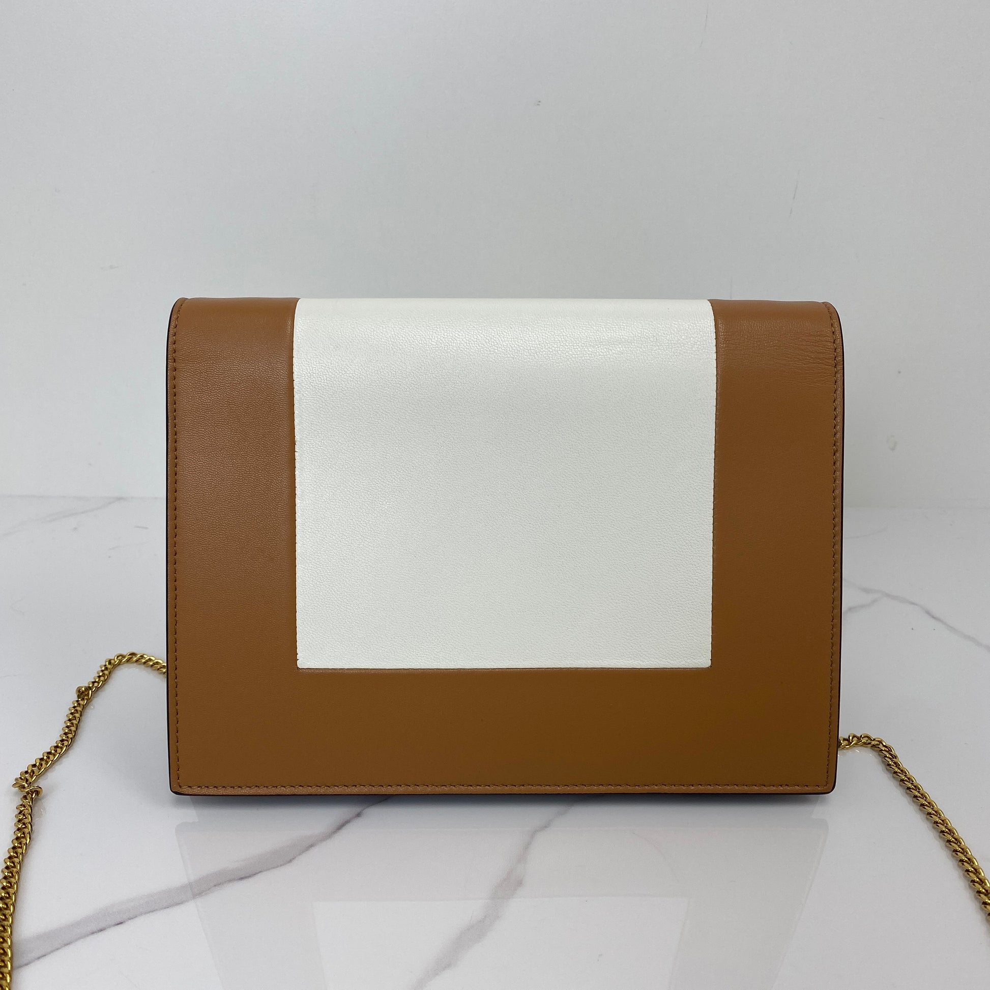 Side profile of the Celine Pocket Envelope WOC
