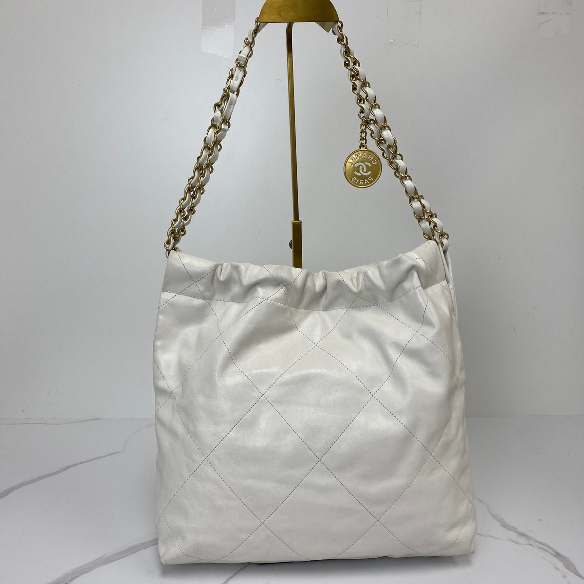 Chanel Small 22 Bag, white shiny calfskin, gold-tone chain — detail view 2