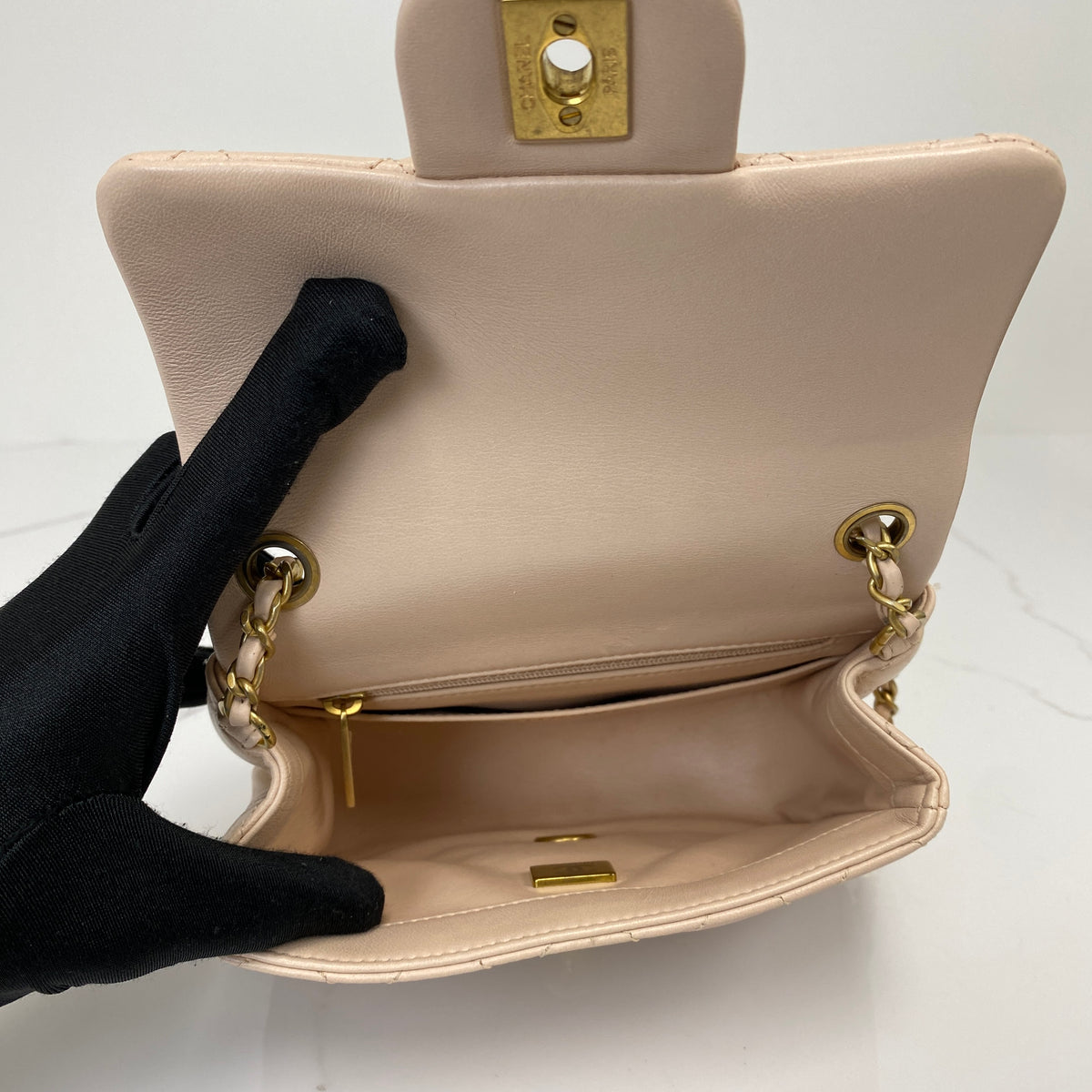 Chanel Mini Classic Flap with Pearl Crush, pink lambskin, antique gold-tone hardware, pearl chain — detail view 5