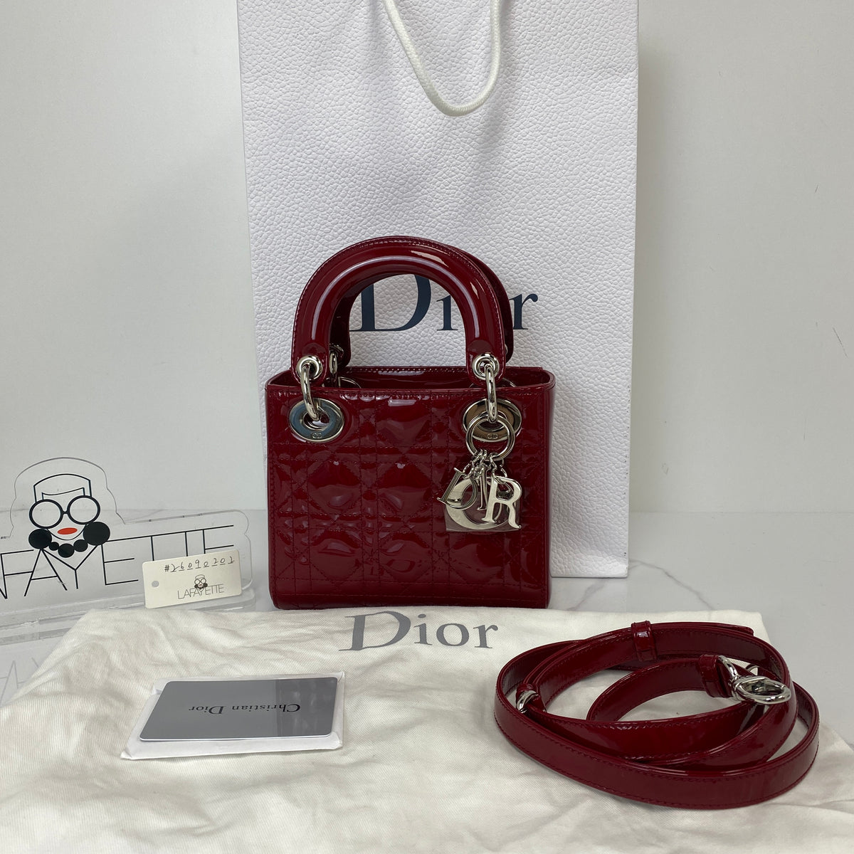 Christian Dior Mini Lady Dior Bag, cherry red patent Cannage calfskin, silver-tone hardware — detail view 1