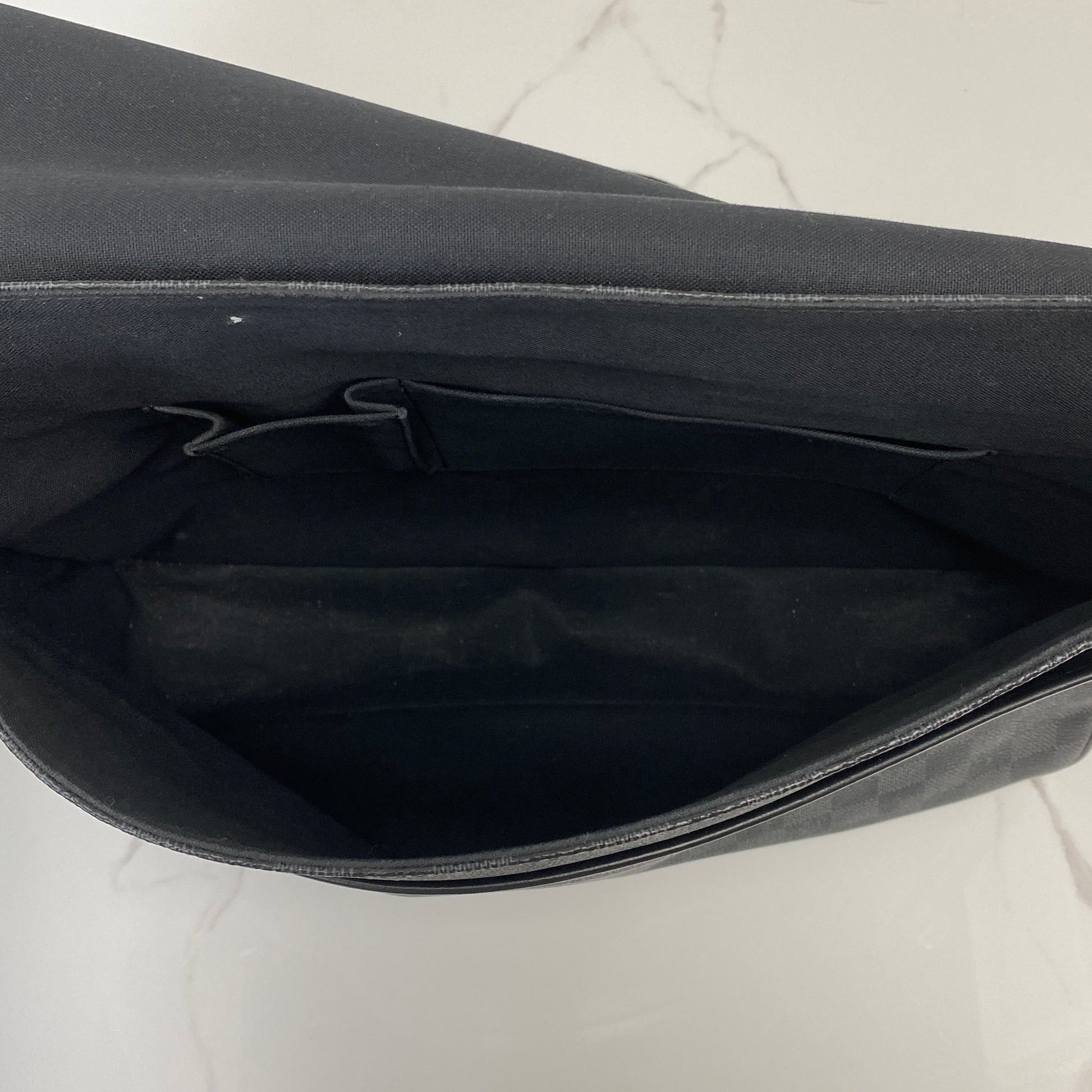 Front view of the LV Damier Graphite messenger bag