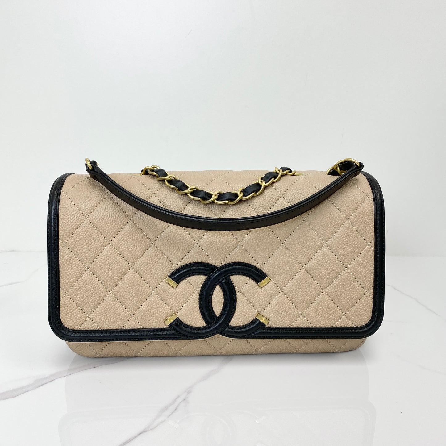 Chanel Caviar Quilted CC Filigree Flap in beige and black with gold-tone hardware