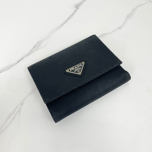 Prada Tessuto Compact Wallet, black Tessuto nylon, silver-tone triangle logo — front view