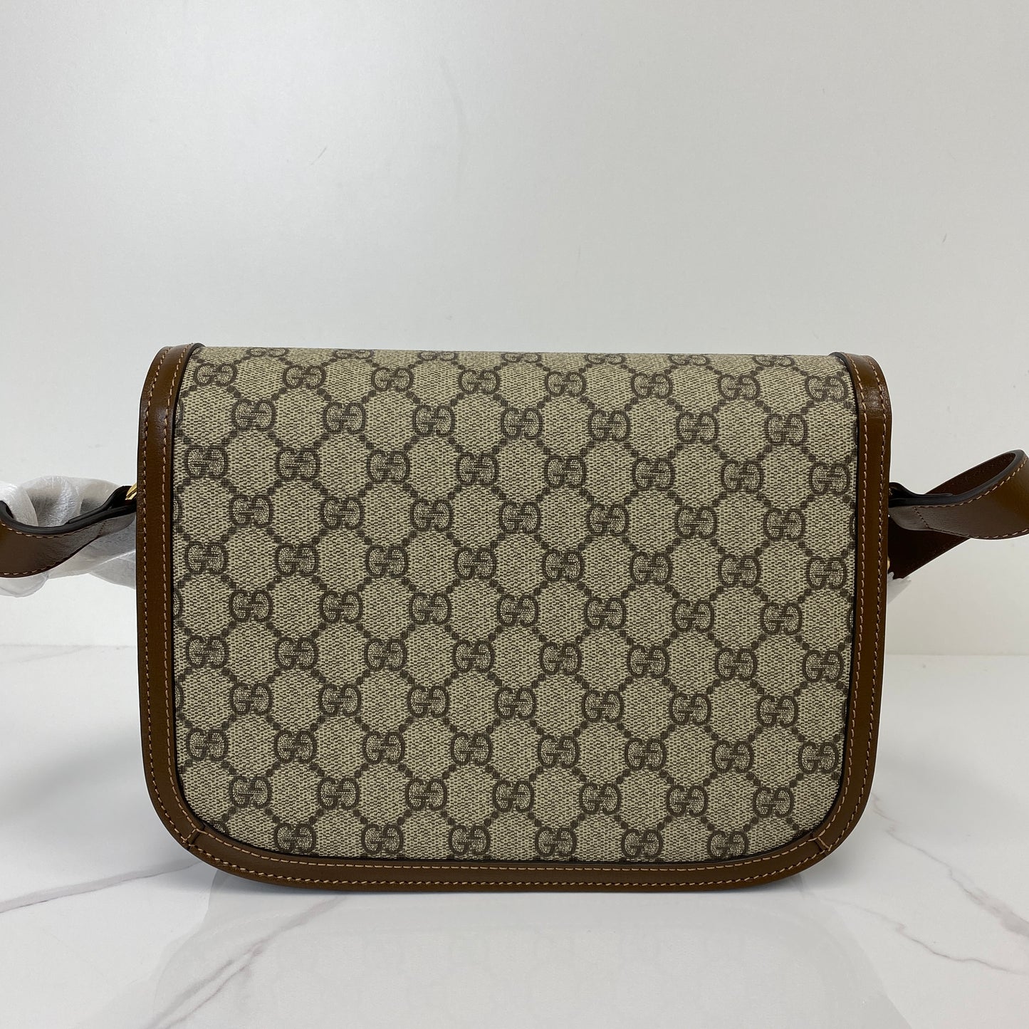 Back view of the Gucci 1955 Horsebit bag in GG Supreme canvas