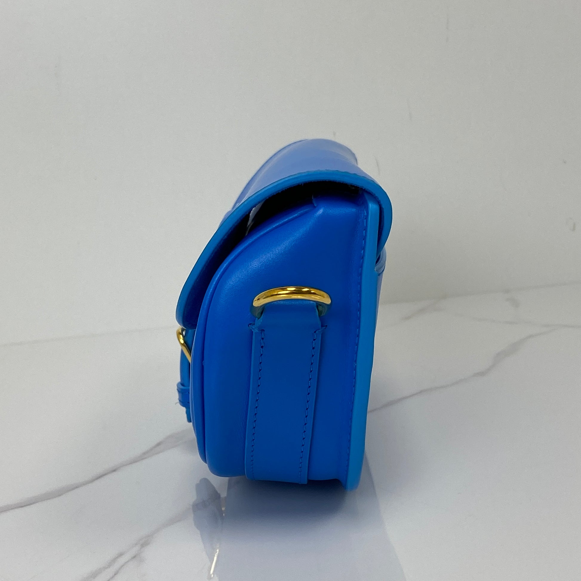 Base of the Bobby East-West bag in blue calfskin