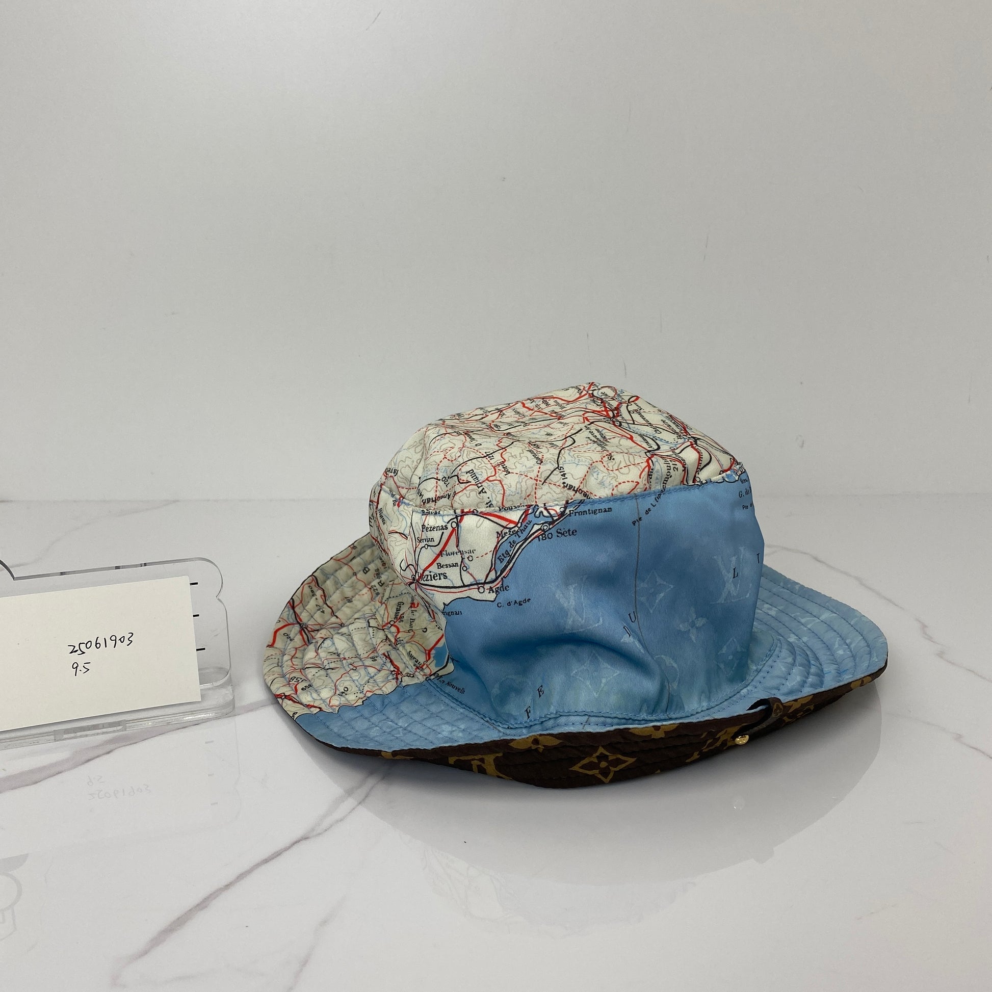Side view of the Louis Vuitton Map Print Hat