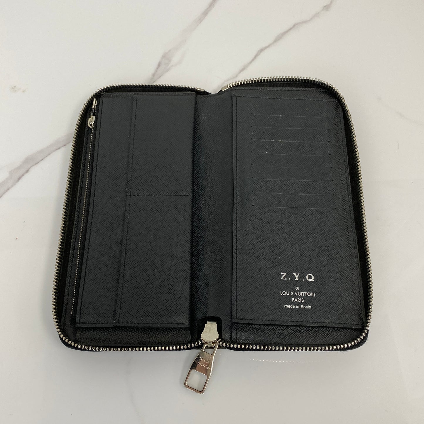 Louis Vuitton Zip Long Wallet open showing compartments
