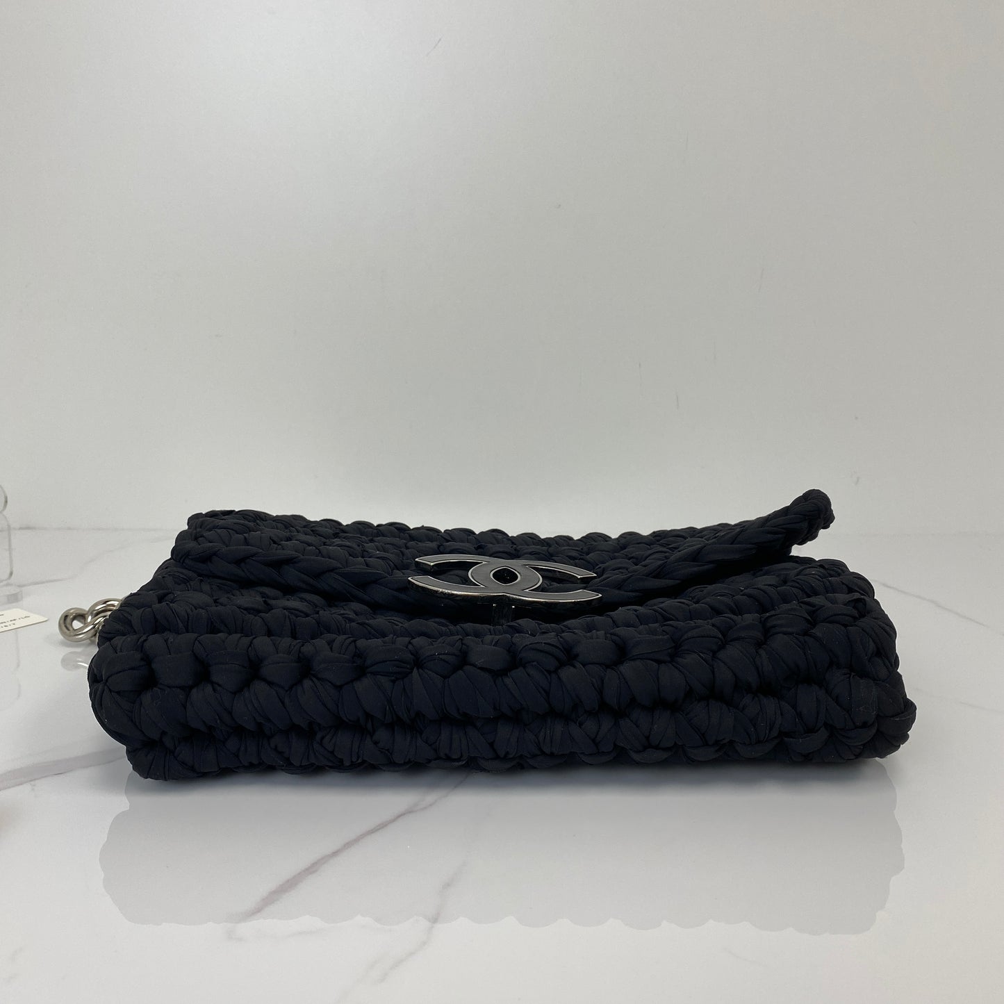 Side profile of the Chanel tweed flap bag