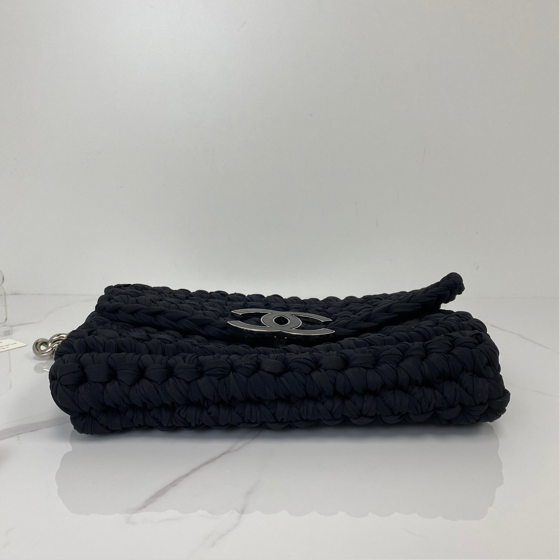 Side profile of the Chanel tweed flap bag