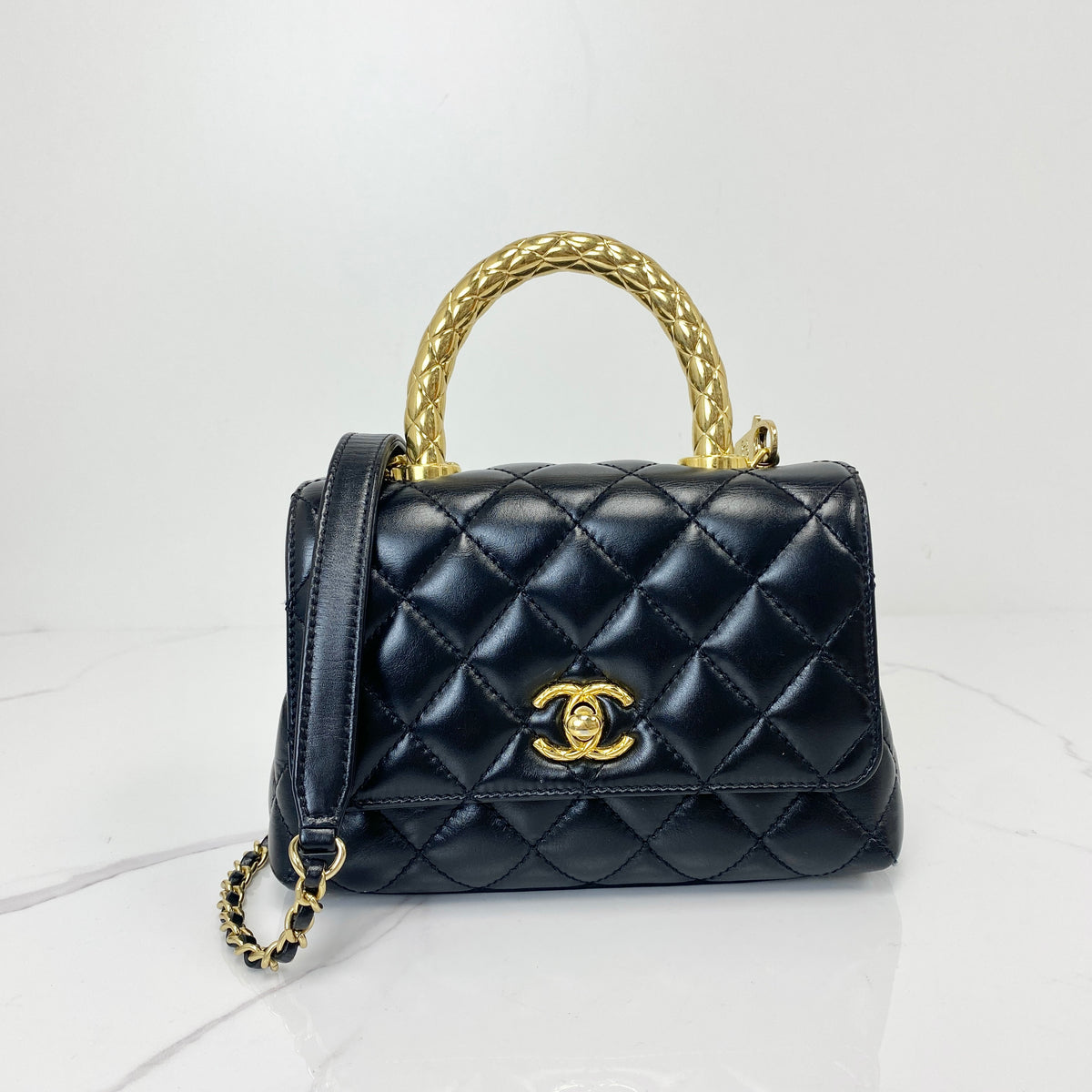 Chanel Mini Coco Handle, black shiny calfskin, gold-tone hardware — front view