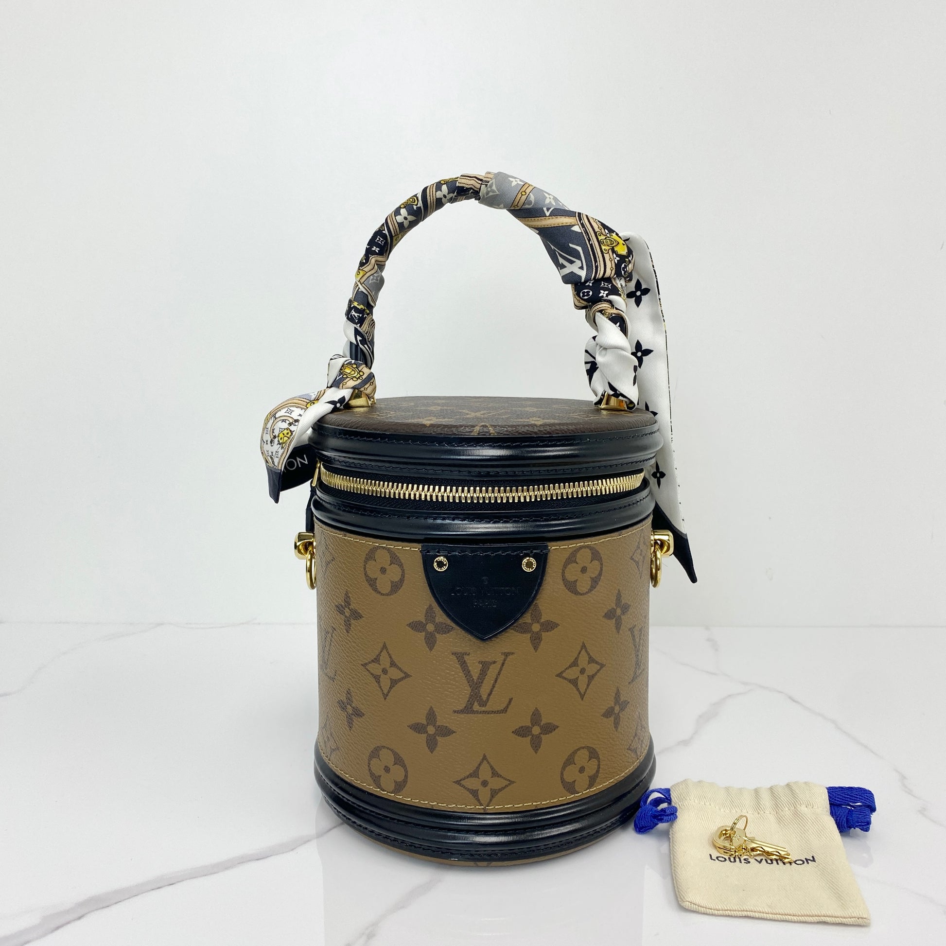 Louis Vuitton Cannes vanity bag in Monogram canvas with navy trim and twilly