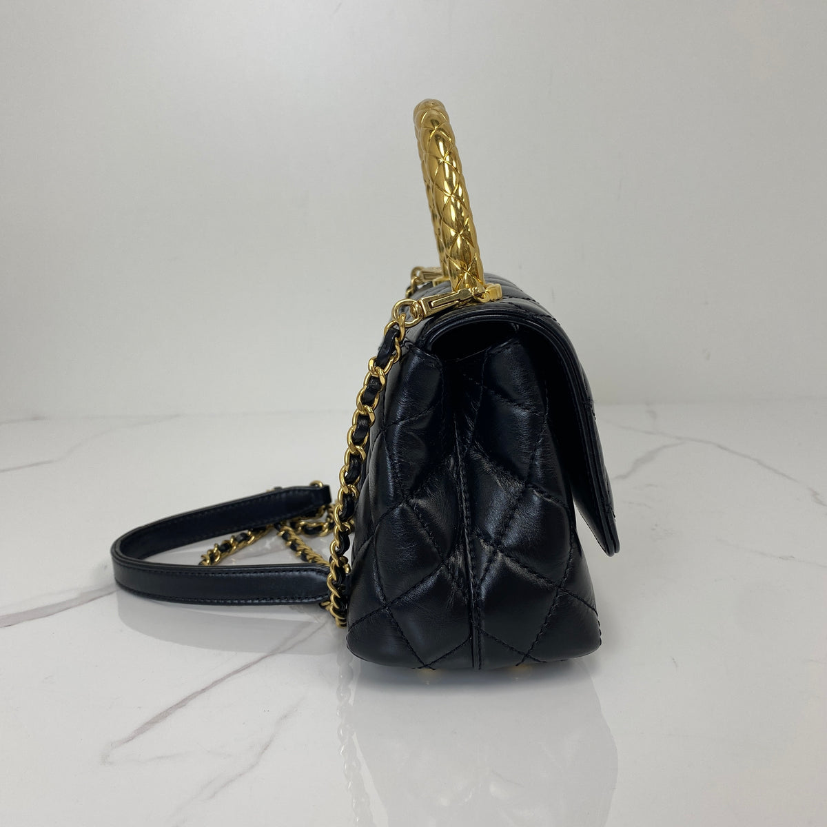 Chanel Mini Coco Handle, black shiny calfskin, gold-tone hardware — detail view 2