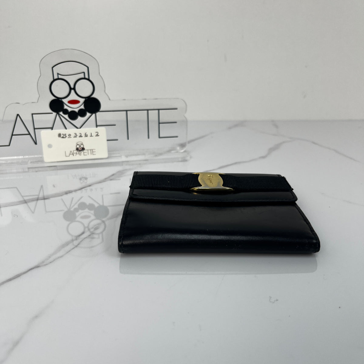 Salvatore Ferragamo Vara Bow Wallet, black calfskin, antique gold-tone Vara bow — detail view 5