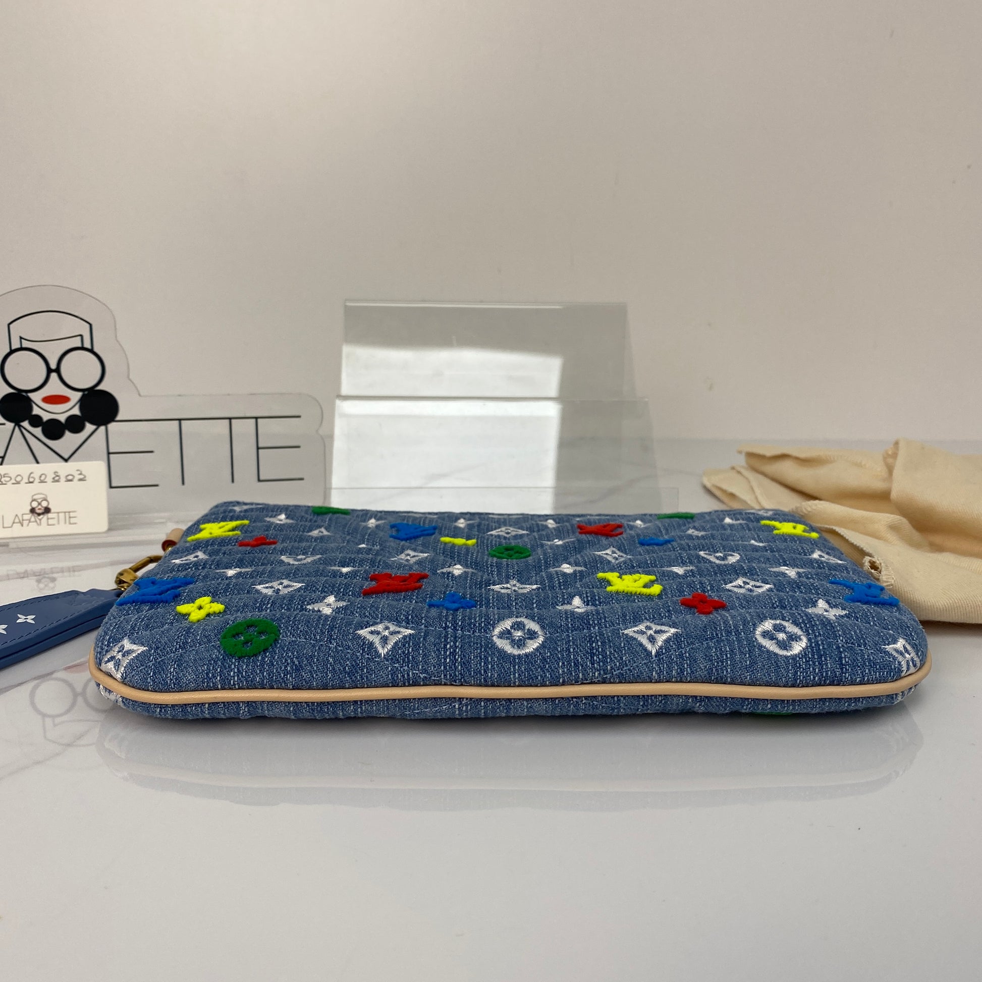 Interior of the Louis Vuitton New Wave zipped pouch
