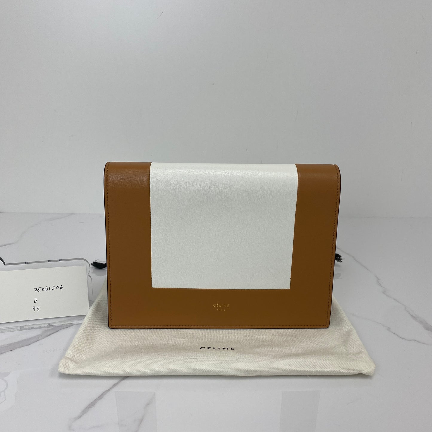 Back view of the Celine envelope wallet on chain